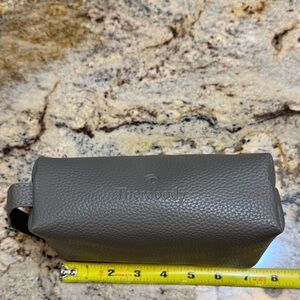 Therabody Textured Pleather Pouch in Dark Gray. Zipper. Great for carry on.